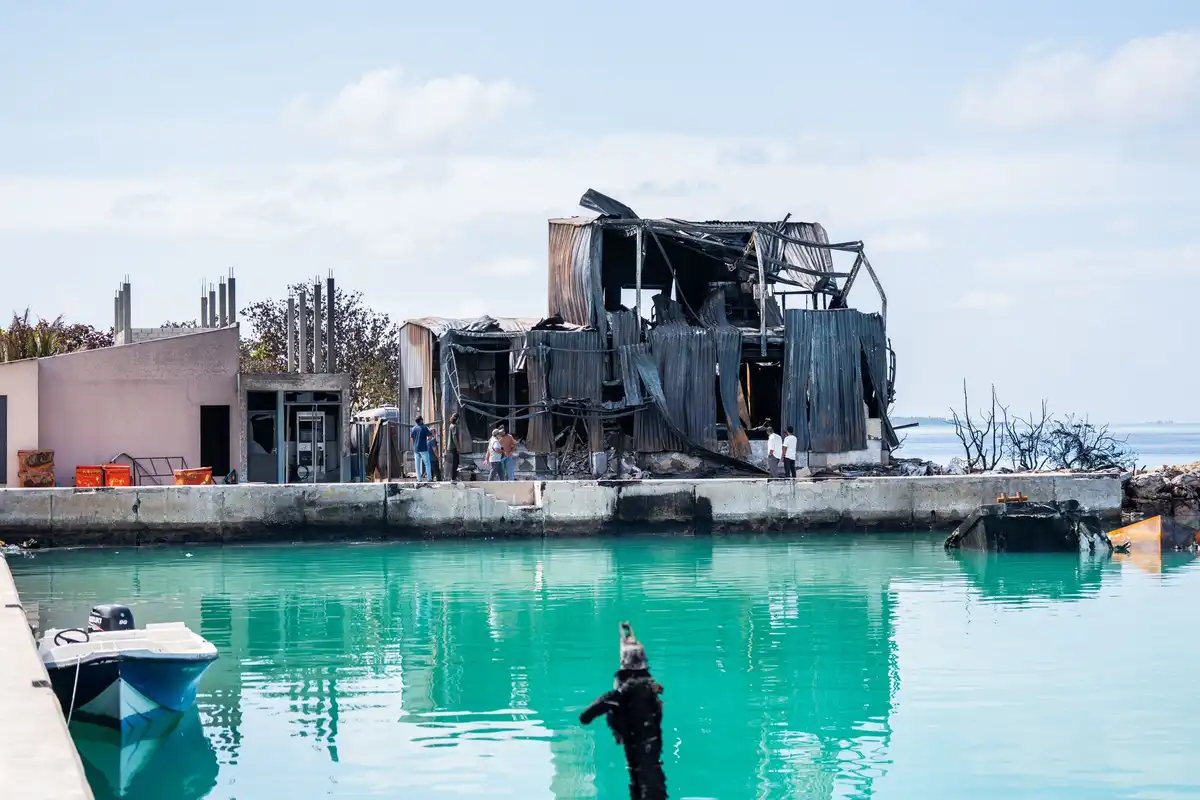 The ice plant in F. Feeali has been completely destroyed by a fire that broke out on a fuel boat docked at the island's harbor. | Fisheries Ministry