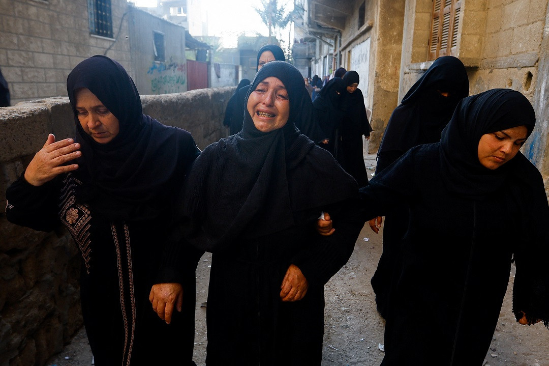 ފަލަސްތީން-އިސްރާއިލް ހަނގުރާމައިގައި ޝަހީދު ހަމާސް އޮފިޝަލެއްގެ ޖަނާޒާގެ ތެރެއިން - ފޮޓޯ: ރޮއިޓަރސް