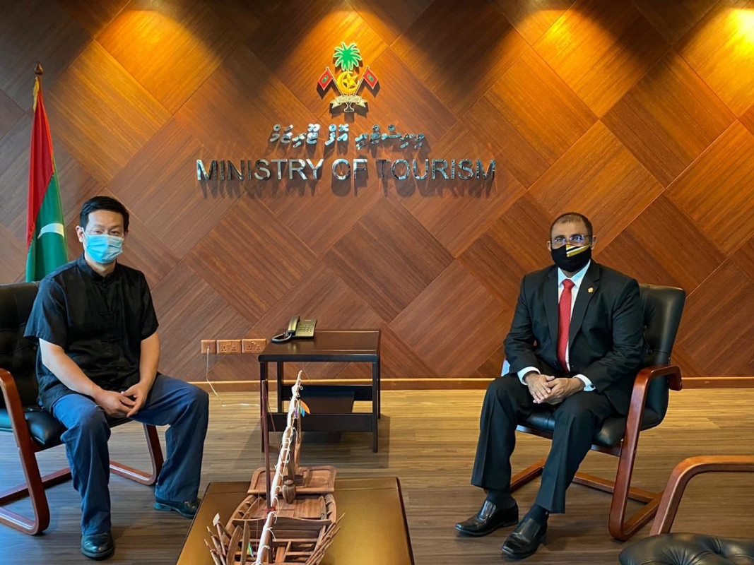 Tourism Minister Dr. Abdulla Mausoom and the Chinese Ambassador to Maldives Zhang Lizhong