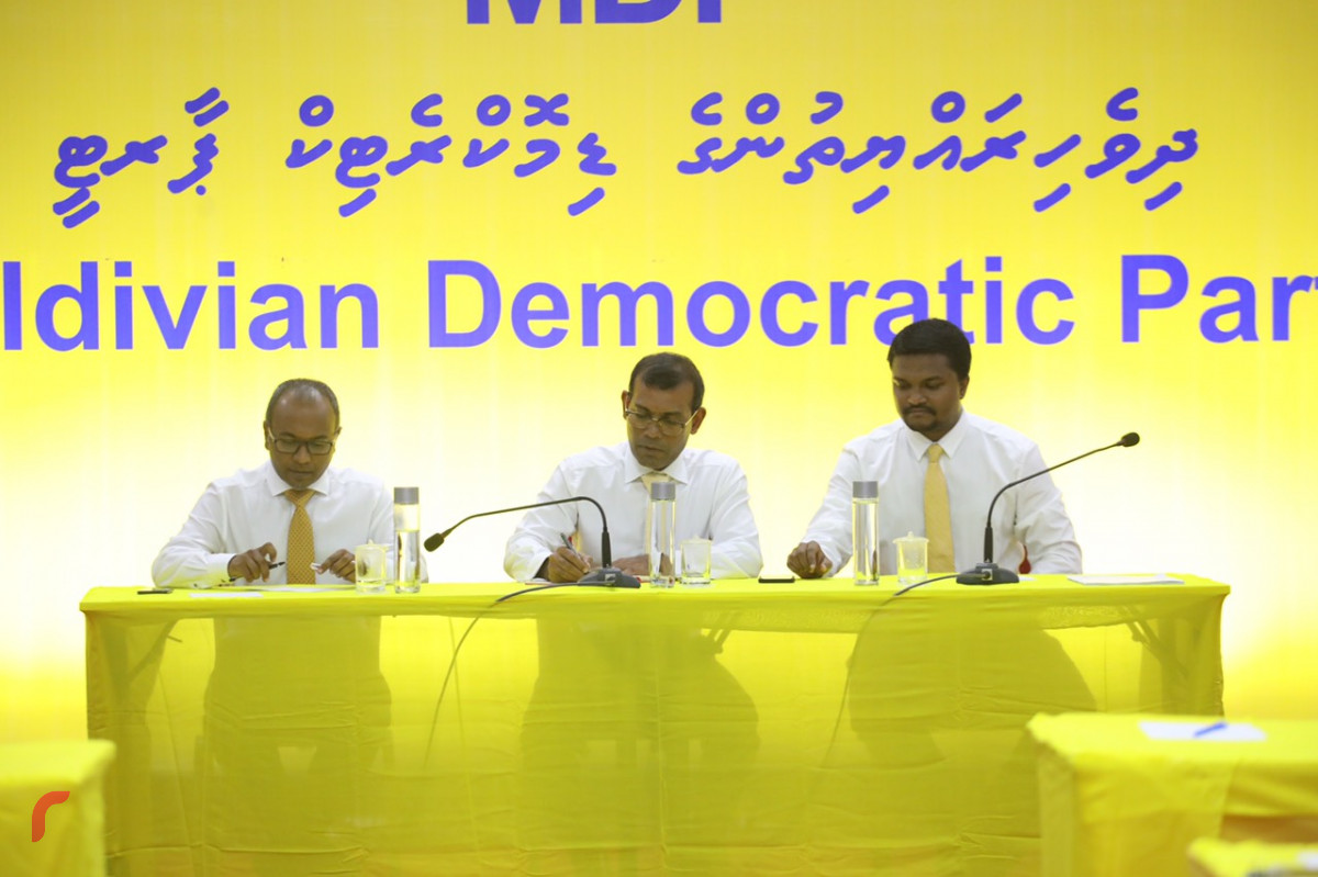 MDP leader former President Mohamed Nasheed (C), chairperson Hassan Latheef (L) and secretary general Anas Abdul Sattar (R)