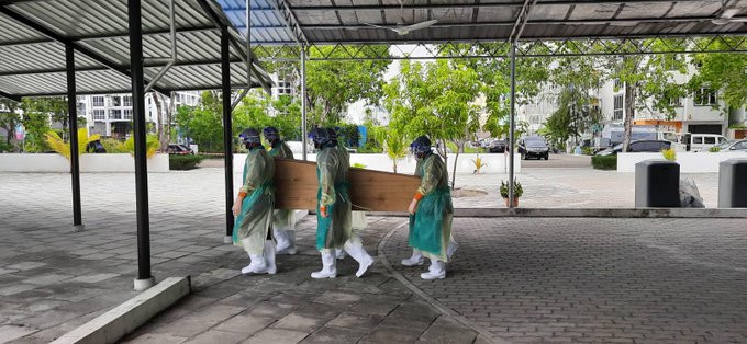 A Covid-19 victim being moved for burial