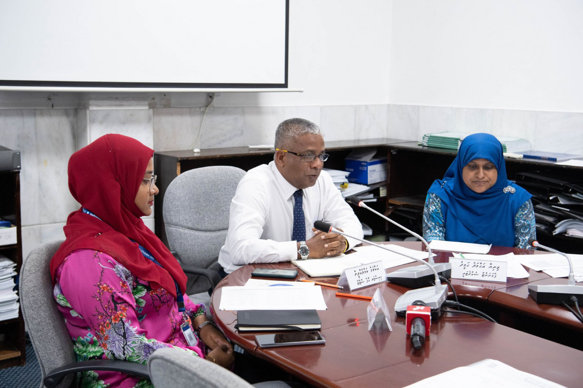 Minister of State for National Planning and Infrastructure, Akram Kamaaluddin with ministry officials at SOE committee meeting