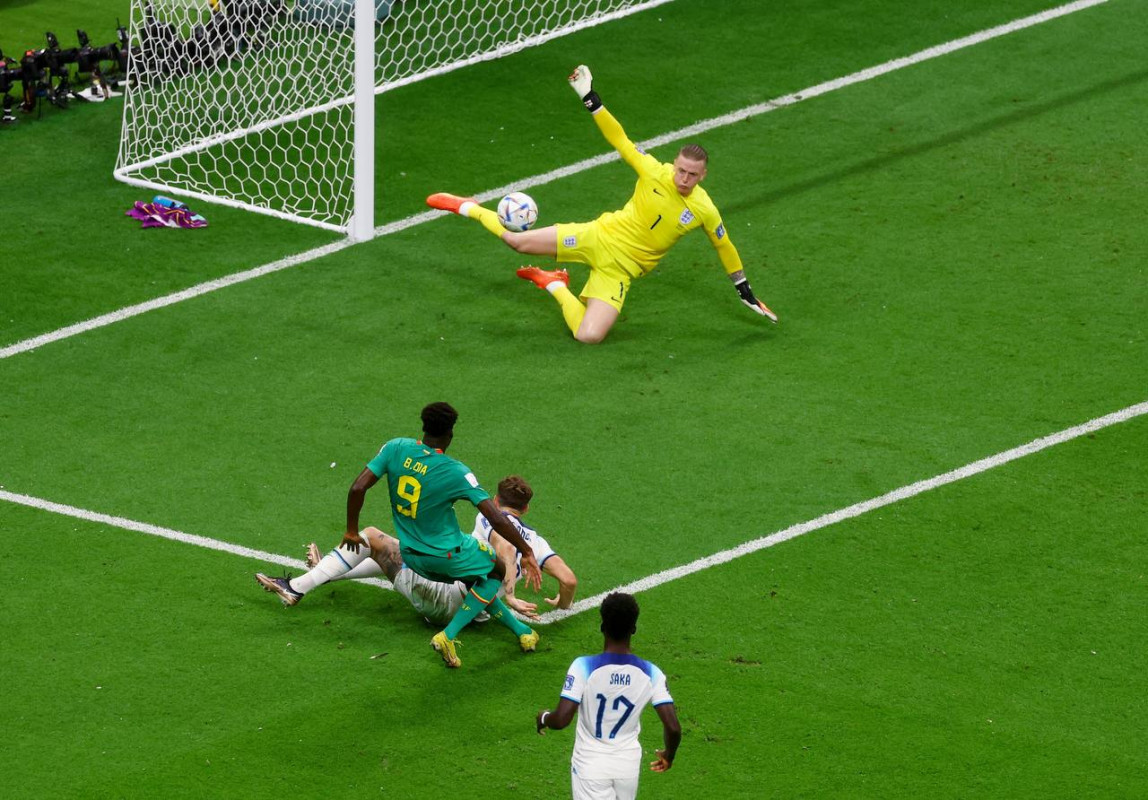 އިންގްލެންޑް އަދި ސެނެގާލް ކުޅުނު މެޗުގެ ތެރެއިން - ފޮޓޯ: ރޮއިޓާސް