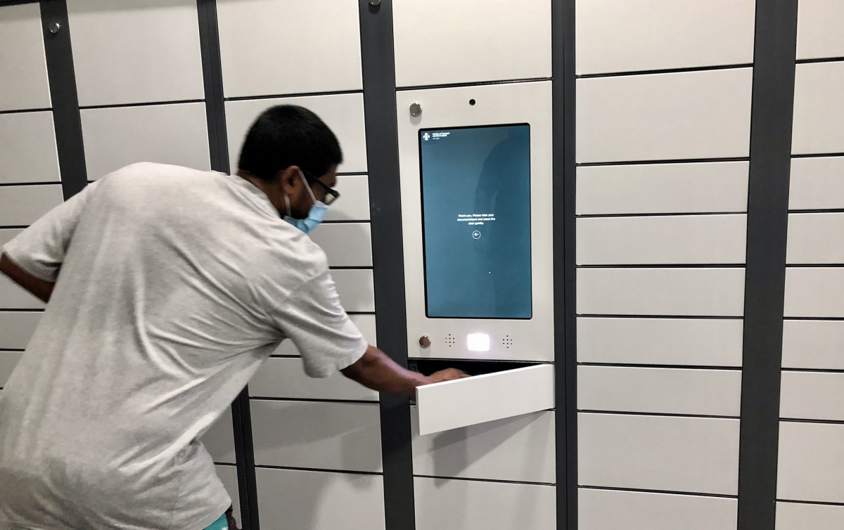 Individual seeking services from a self-collection station