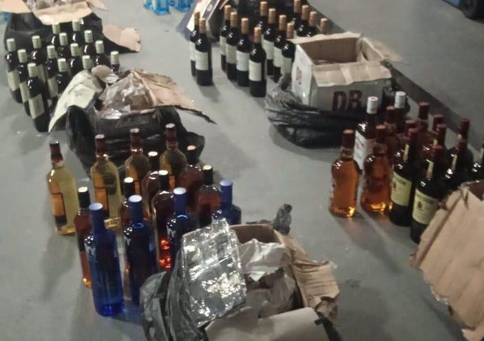 Bottles of alcohol confiscated by authorities in connection with the case