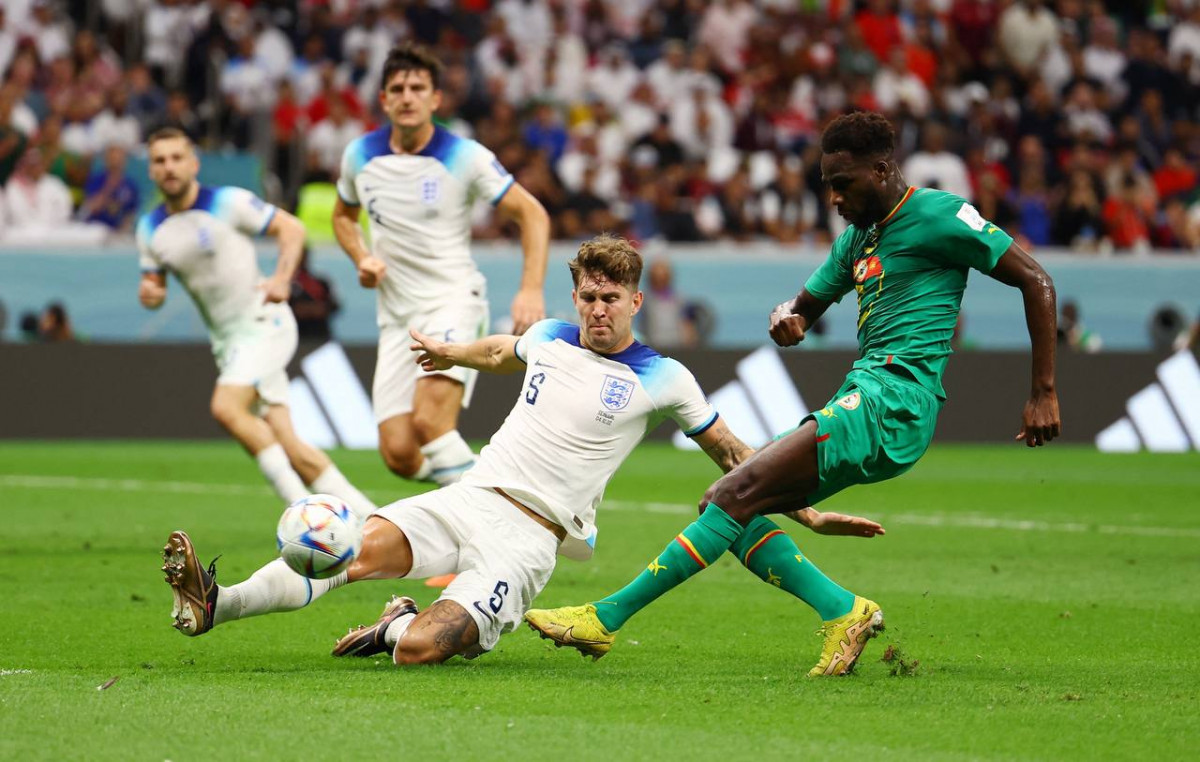 އިންގްލެންޑް އަދި ސެނެގާލް ކުޅުނު މެޗުގެ ތެރެއިން - ފޮޓޯ: ރޮއިޓާސް