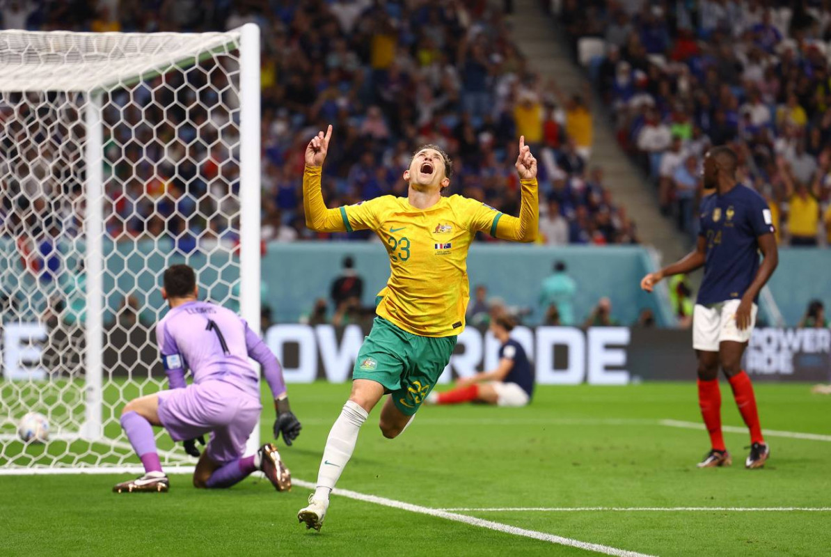 ފްރާންސް އަދި އޮސްޓްރޭލިޔާ ކުޅުނު މެޗުގެ ތެރެއިން، ލަނޑު ޖެހުމަށް ފަހު އޮސްޓްރޭލިޔާގެ ގުޑްވިން އުފާ ފާޅު ކުރަނީ - ފޮޓޯ: ރޮއިޓާސް