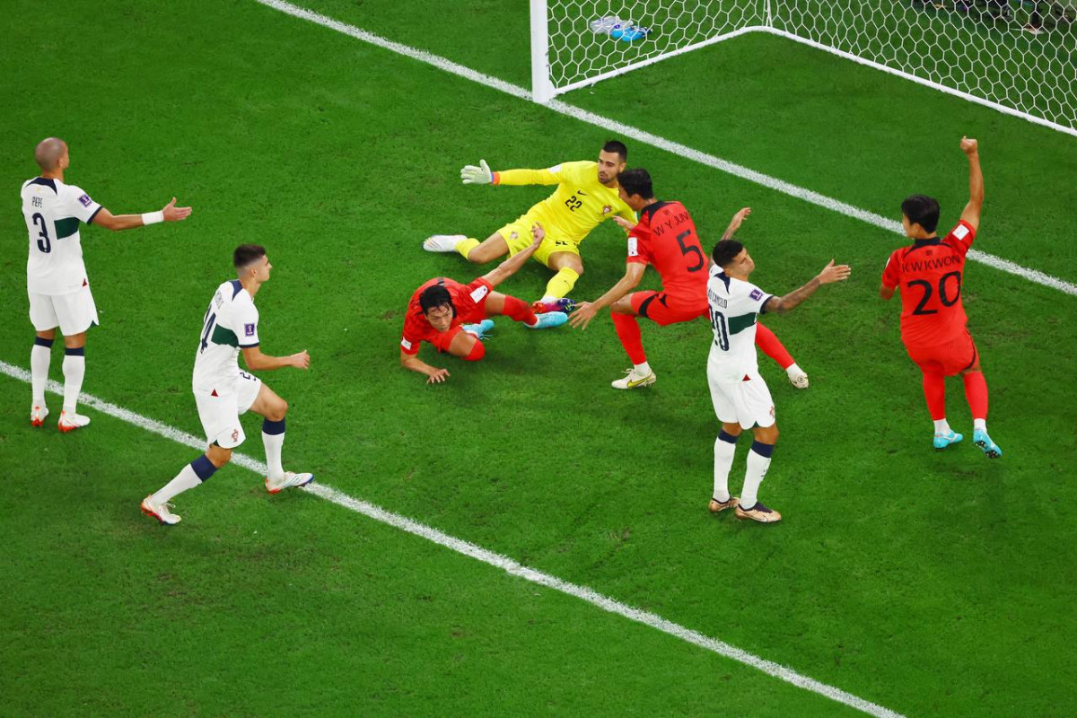 ކޮރެއާ އަދި ޕޯޗުގަލް ބައްދަލު ކުރި މެޗުގެ ތެރެއިން - ފޮޓޯ: ރޮއިޓާސް