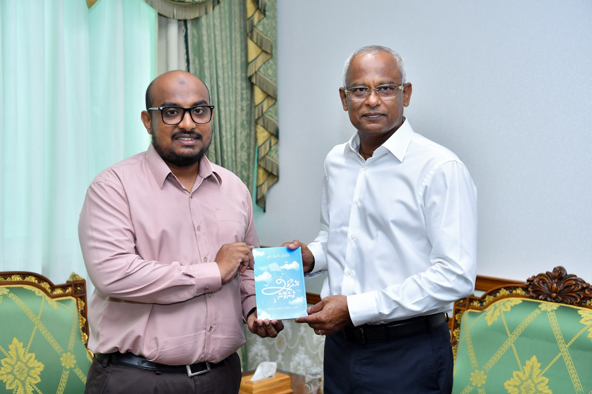 President receives book on mental health 'Edhuvas Geneveyne' by journalist Saail Ali