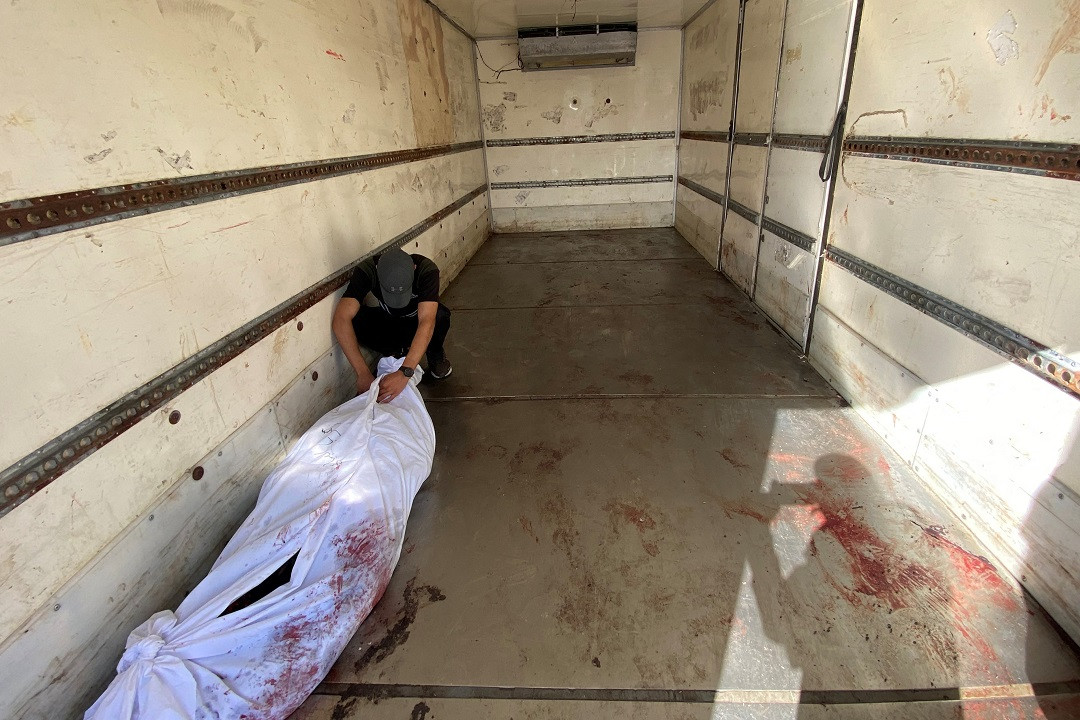 އިސްރާއިލްގެ ހަމަލާތަކުގައި މަރުވެފައިވާ މީހެއްގެ ހަށިގަނޑެއް - ފޮޓޯ: ރޮއިޓާރސް