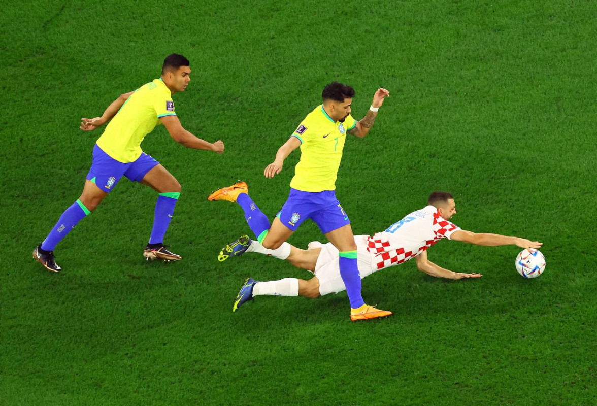 ބްރެޒިލް އަދި ކްރޮއޭޝިއާ ކުޅުނު މެޗުގެ ތެރެއިން - ފޮޓޯ: ރޮއިޓާސް