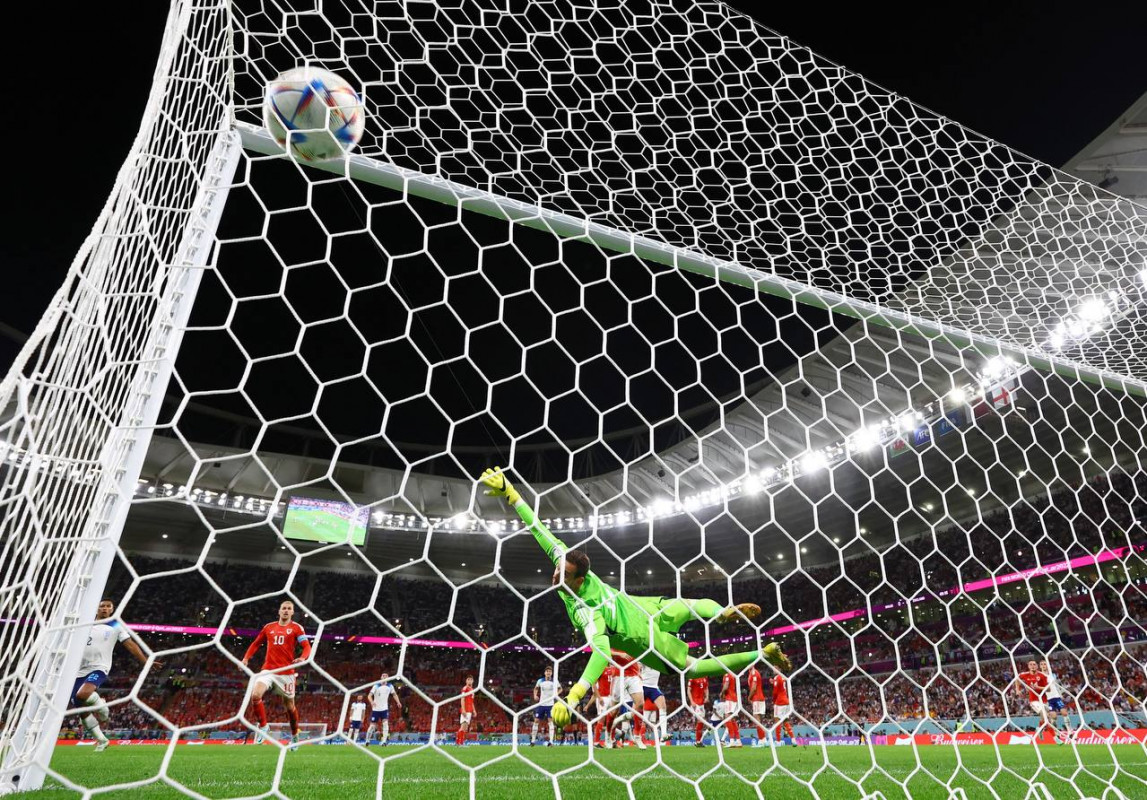 ވޭލްސް އަދި އިންގްލެންޑް ކުޅުނު މެޗުގެ ތެރެއިން - ފޮޓޯ: ރޮއިޓާސް