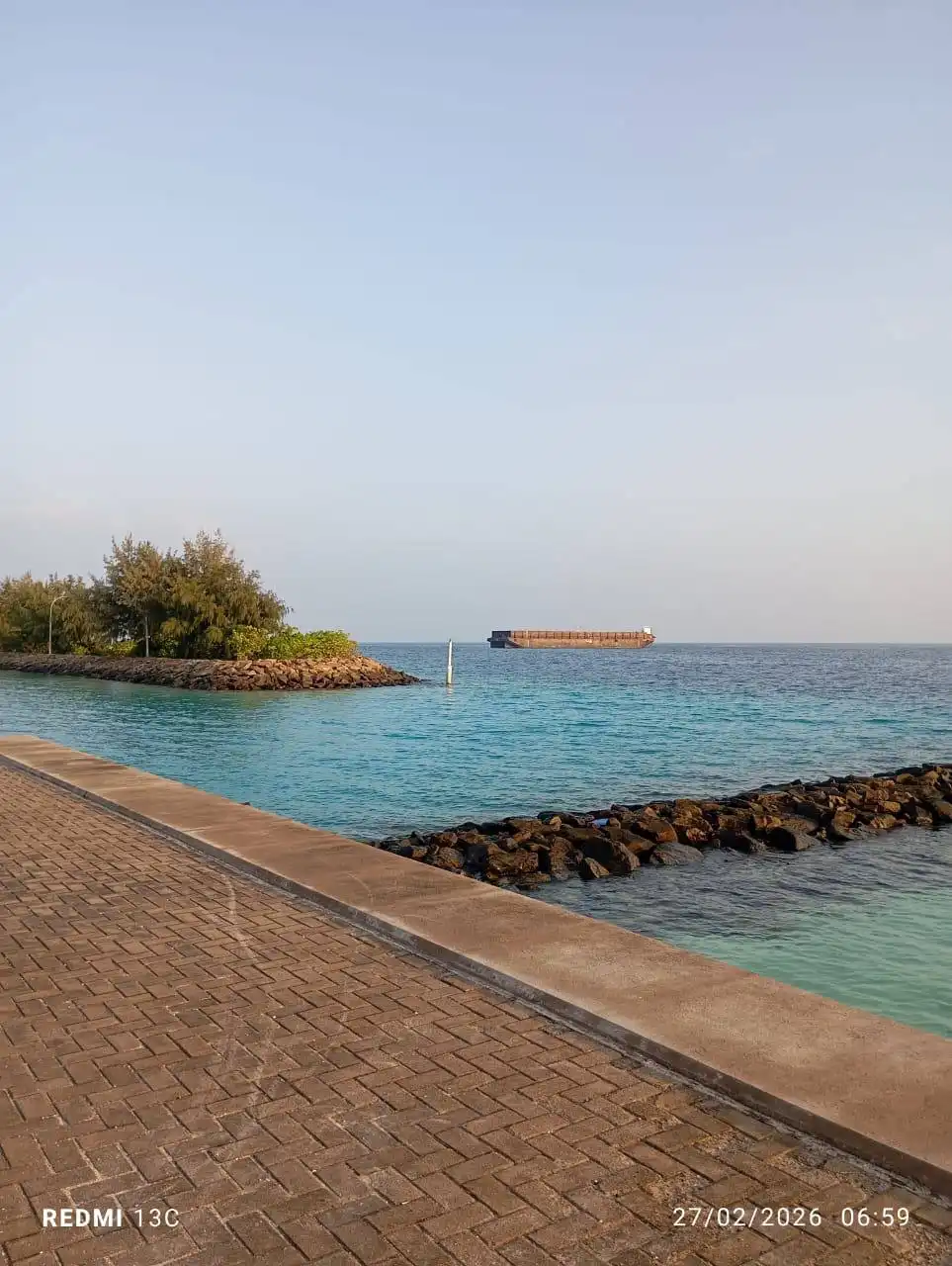 An MTCC barge arrives to collect the sand and gravel brought for the development of F. Magoodhoo Airport. | RaajjeMV