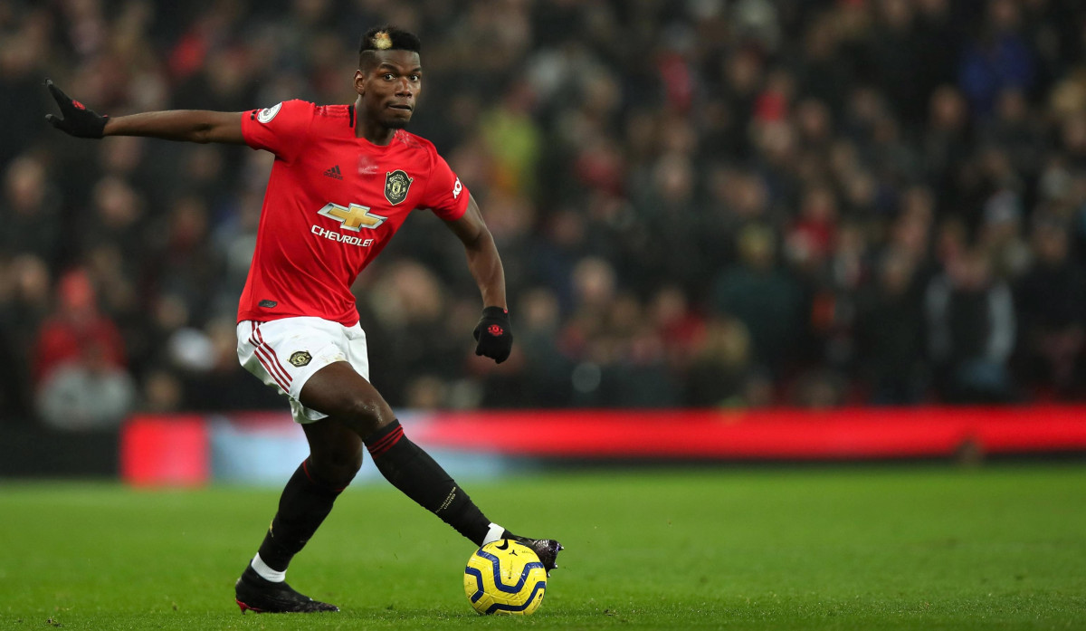 މެންޗެސްޓާ ޔުނައިޓެޑަށް ކުޅެމުން އަންނަ ފްރާންސްގެ މިޑްފީލްޑަރު ޕައުލް ޕޮގްބާ