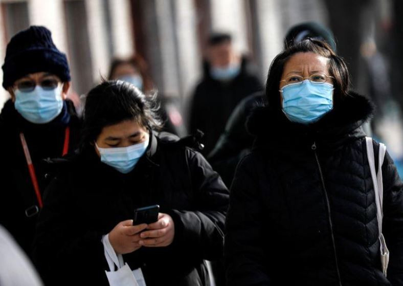 ބެއިޖިންގ ގައި މީހުން މާސްކު އަޅައިގެން