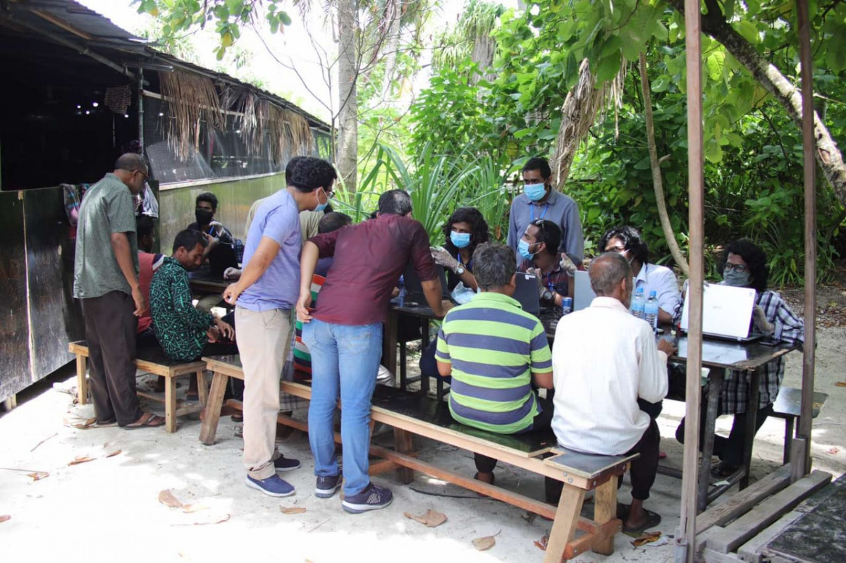 Workers in Bodufinolhu island, being developed as a resort